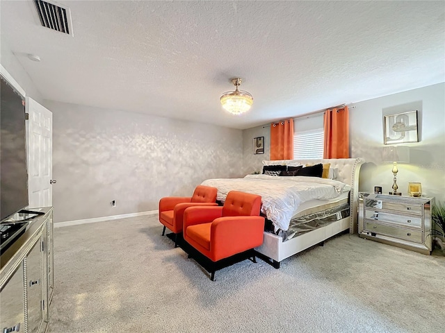 bedroom featuring a textured ceiling