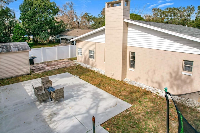 exterior space featuring a storage unit