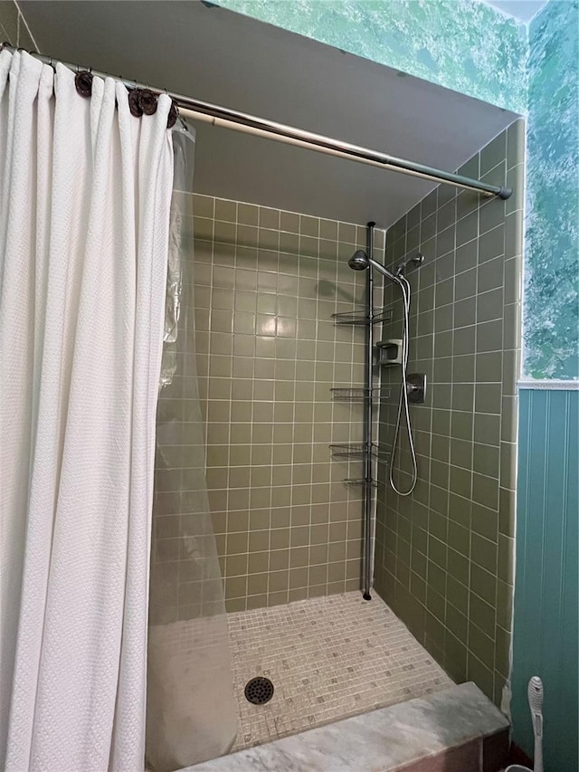 bathroom with a shower with shower curtain