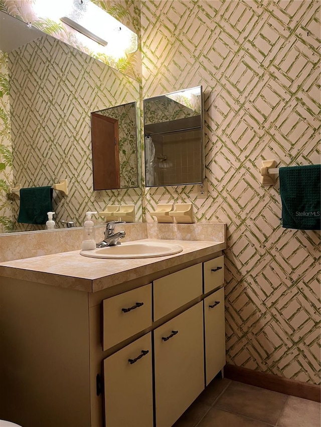 bathroom with vanity and tile patterned flooring