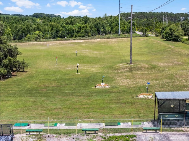 view of home's community with a lawn