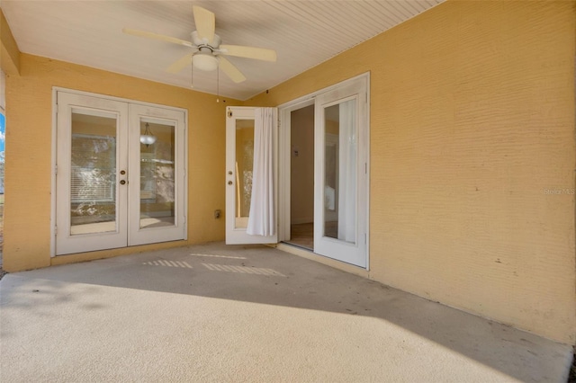 exterior space with a patio, ceiling fan, and french doors