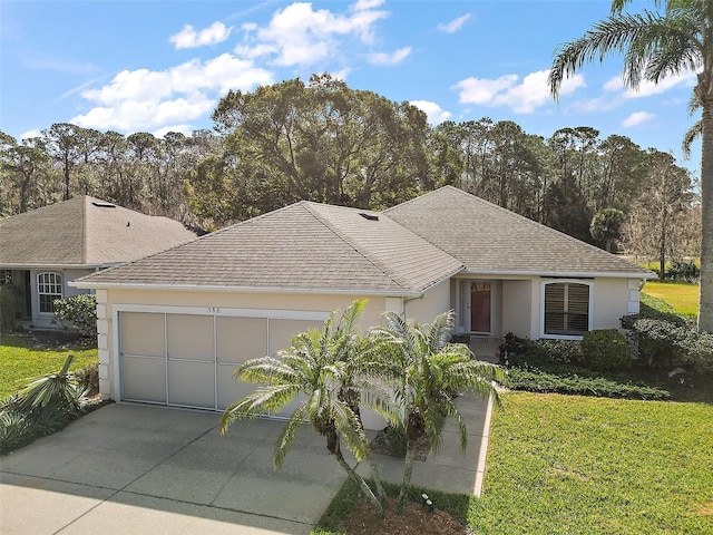 ranch-style house with a garage and a front lawn