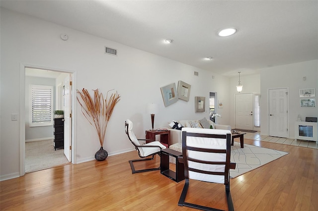 living room with light hardwood / wood-style floors