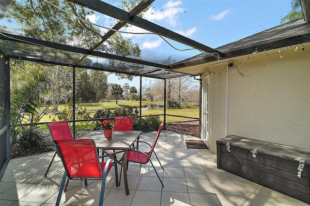 view of patio / terrace with a lanai