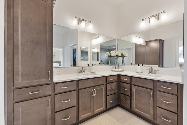 bathroom featuring tile patterned floors and vanity