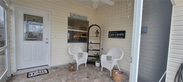 doorway to property featuring covered porch