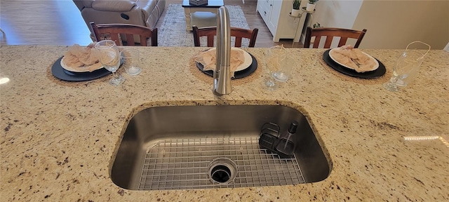 3621 Amelia Ave, The Villages, FL 32162 - dining area view of a sink and wood finished floors