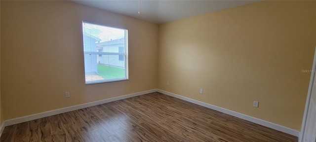 3621 Amelia Ave, The Villages, FL 32162 - spare room featuring wood finished floors and baseboards