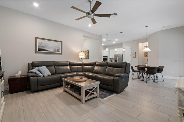 living room featuring ceiling fan