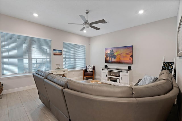 living room featuring ceiling fan