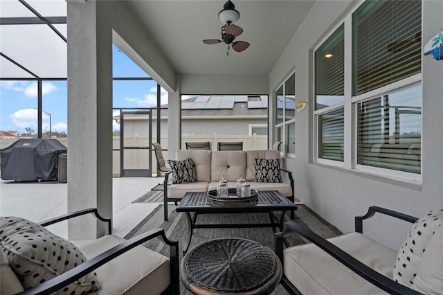 exterior space featuring ceiling fan