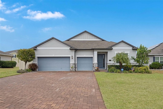 ranch-style home featuring a garage and a front yard