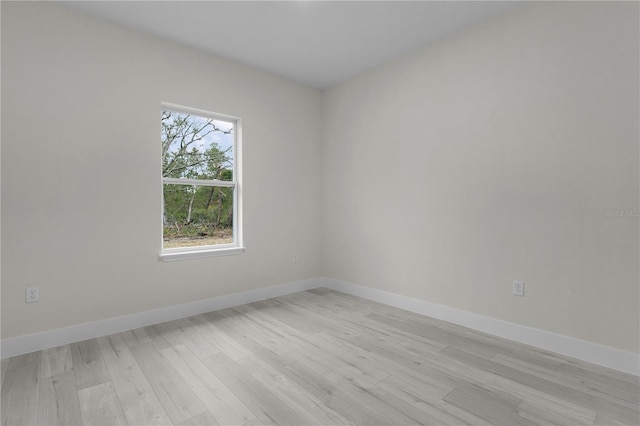 unfurnished room with plenty of natural light and light wood-type flooring