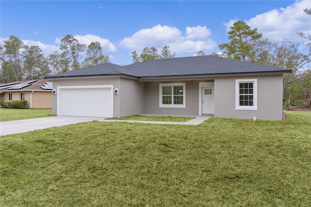 ranch-style home featuring a garage and a front yard