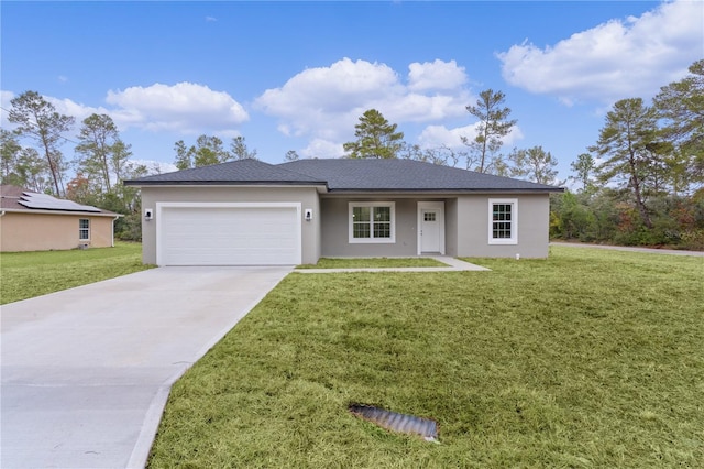 single story home with a garage and a front lawn