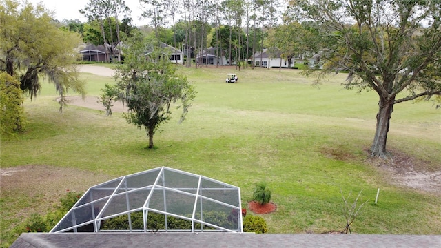 view of community with a yard