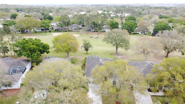 birds eye view of property with a residential view