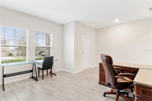 home office with light wood-type flooring