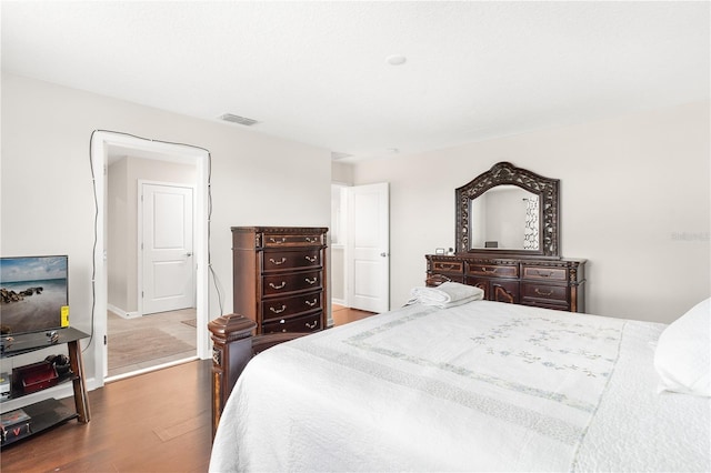 bedroom featuring hardwood / wood-style floors