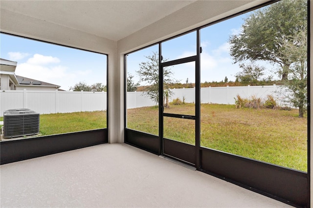 unfurnished sunroom featuring plenty of natural light