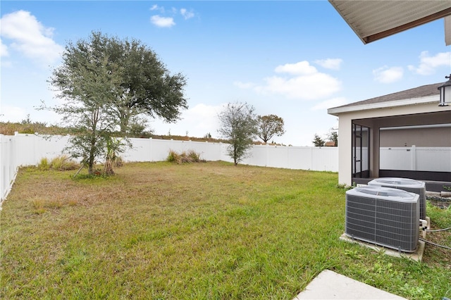 view of yard with central AC