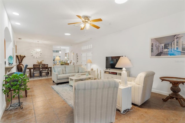 living room featuring ceiling fan