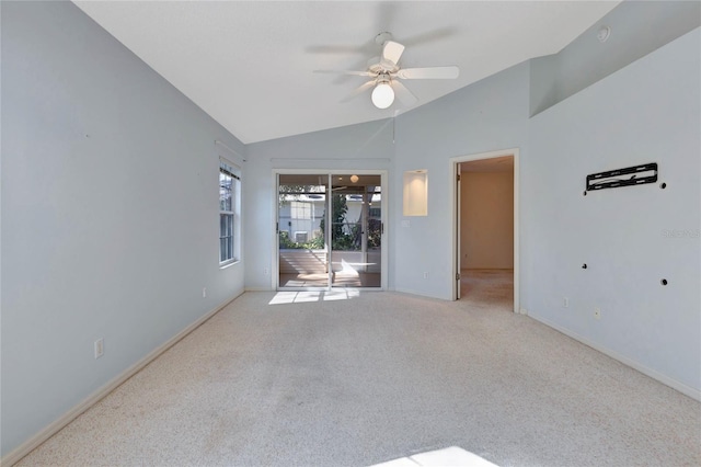 unfurnished living room featuring light carpet, vaulted ceiling, and ceiling fan