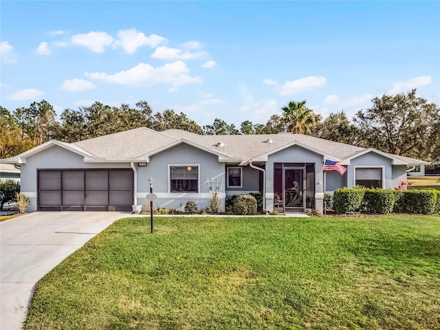 ranch-style house with a garage and a front lawn