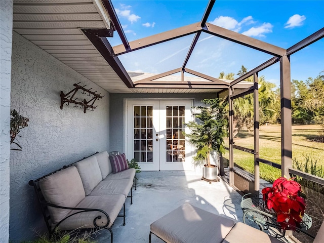 sunroom featuring french doors