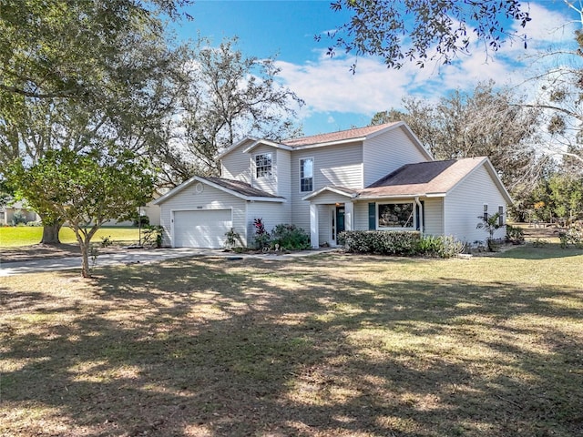 view of property featuring a garage and a front yard