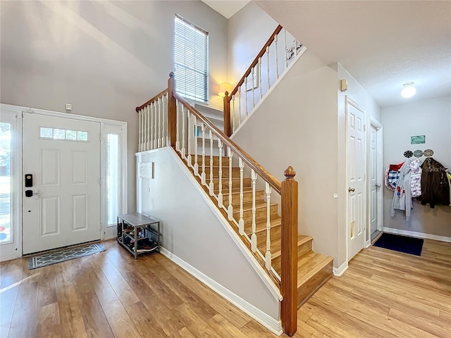 entryway with light hardwood / wood-style flooring