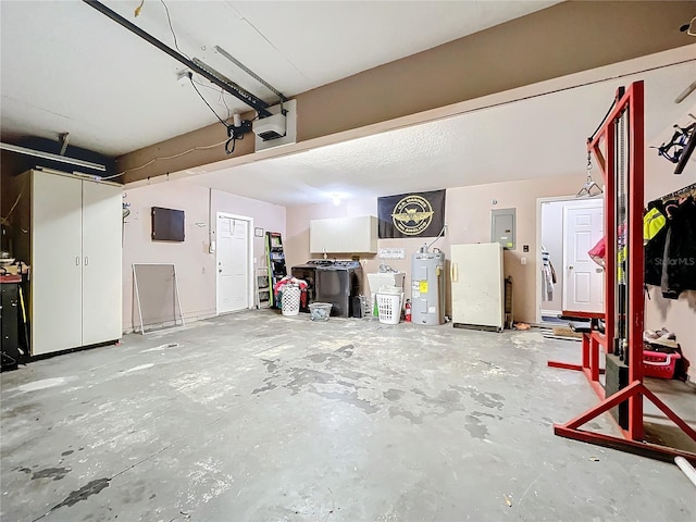 garage featuring a garage door opener, electric panel, water heater, and white refrigerator