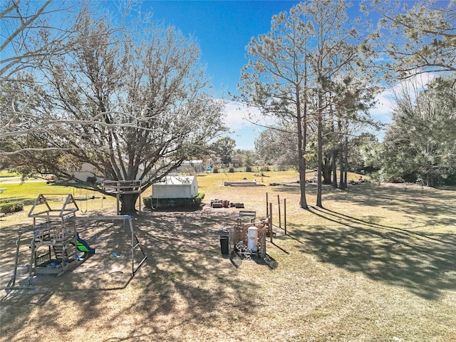 view of yard with a playground