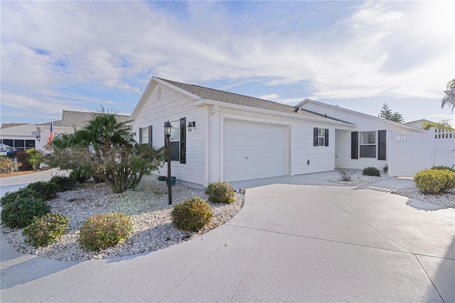 single story home featuring a garage