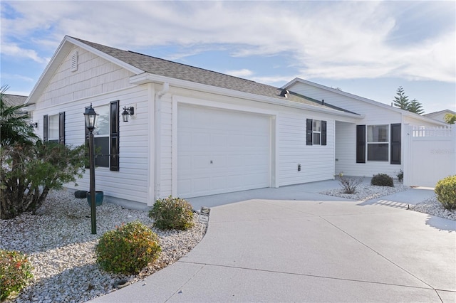 single story home featuring a garage