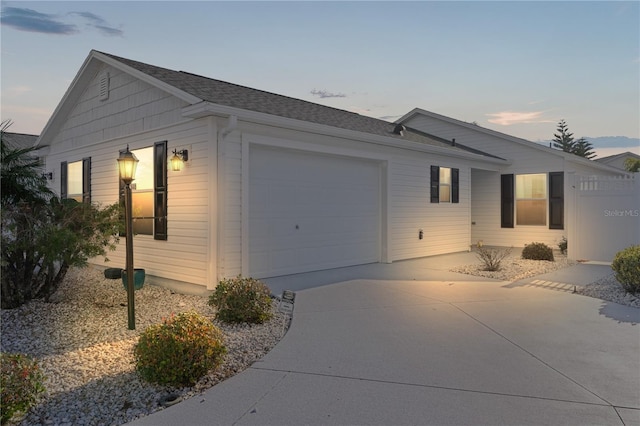 view of front of property featuring a garage