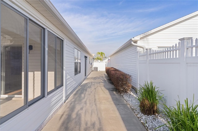 view of side of home with a patio area