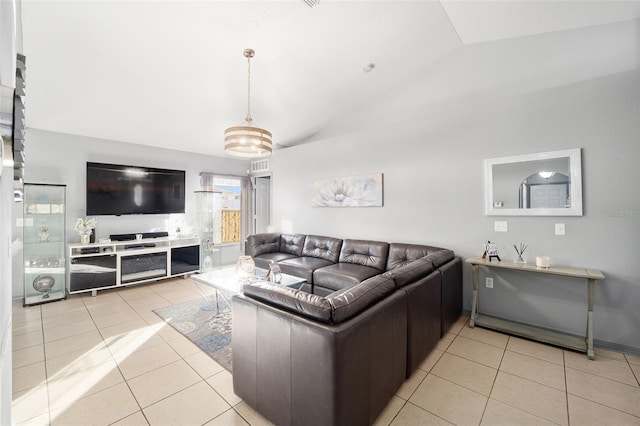 tiled living room featuring lofted ceiling