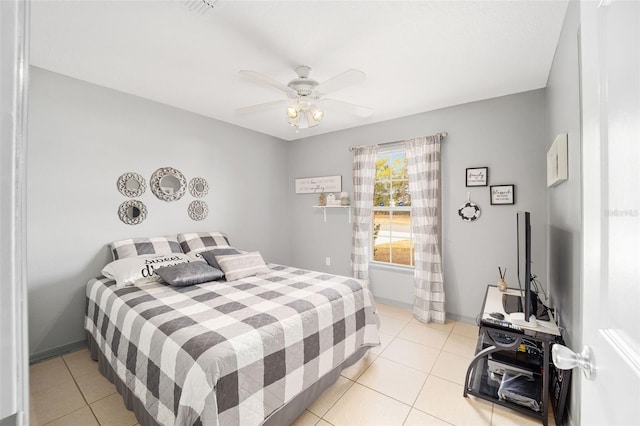 bedroom with light tile patterned floors and ceiling fan