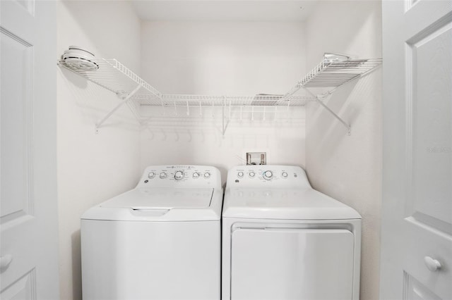 laundry area featuring independent washer and dryer