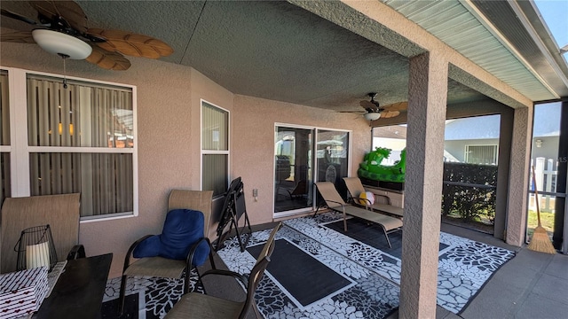 view of patio / terrace featuring ceiling fan