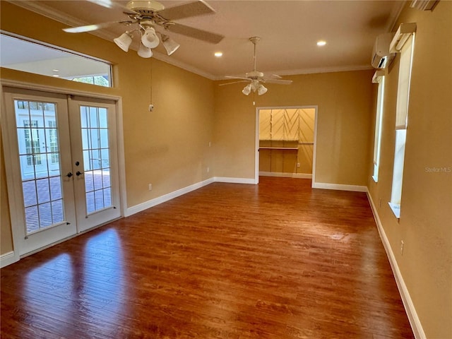 unfurnished living room featuring hardwood / wood-style floors, ceiling fan, crown molding, a wall unit AC, and french doors