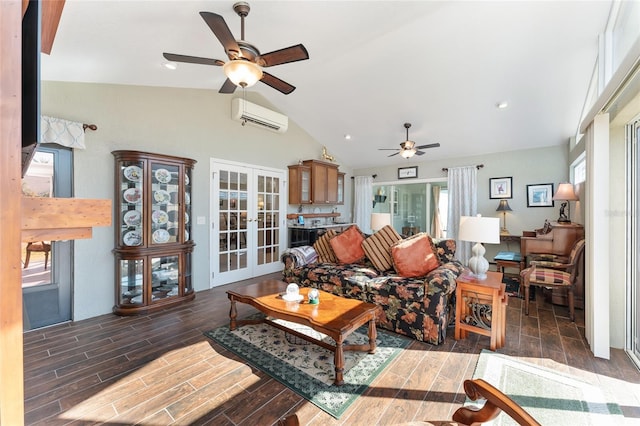 living room featuring lofted ceiling, a wall unit AC, french doors, and ceiling fan