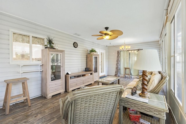 sunroom / solarium with ceiling fan