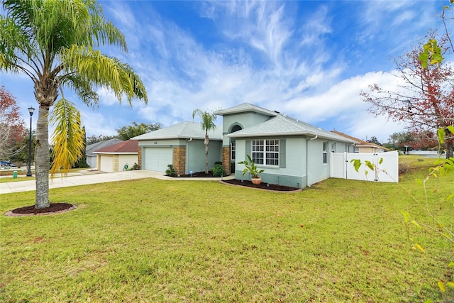 single story home with a garage and a front lawn