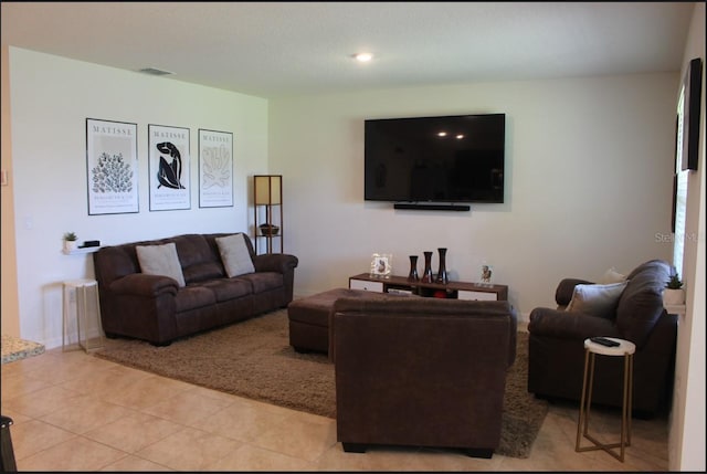 living room with light tile patterned floors