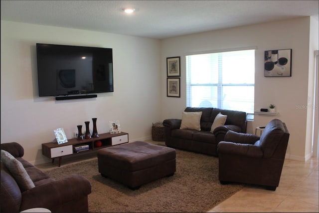 living room featuring light tile patterned floors