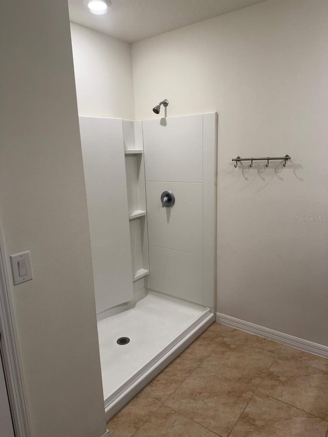 bathroom featuring walk in shower