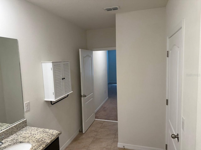 bathroom featuring vanity and tile patterned floors